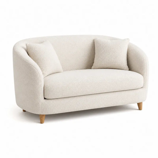 Sofa dwuosobowa bouclé beżowa z poduszkami